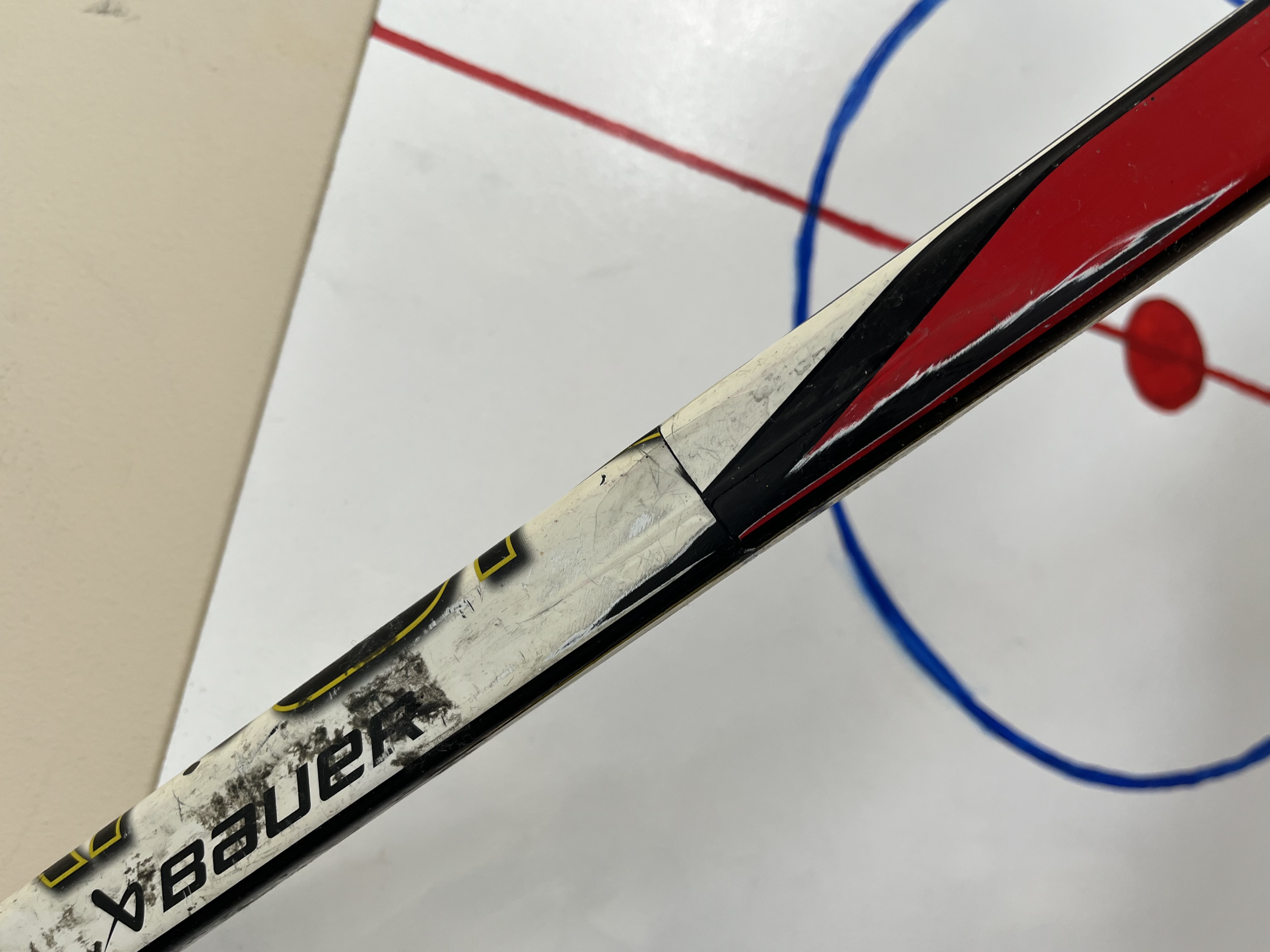 Close-up of the repaired joint on the youth stick shaft