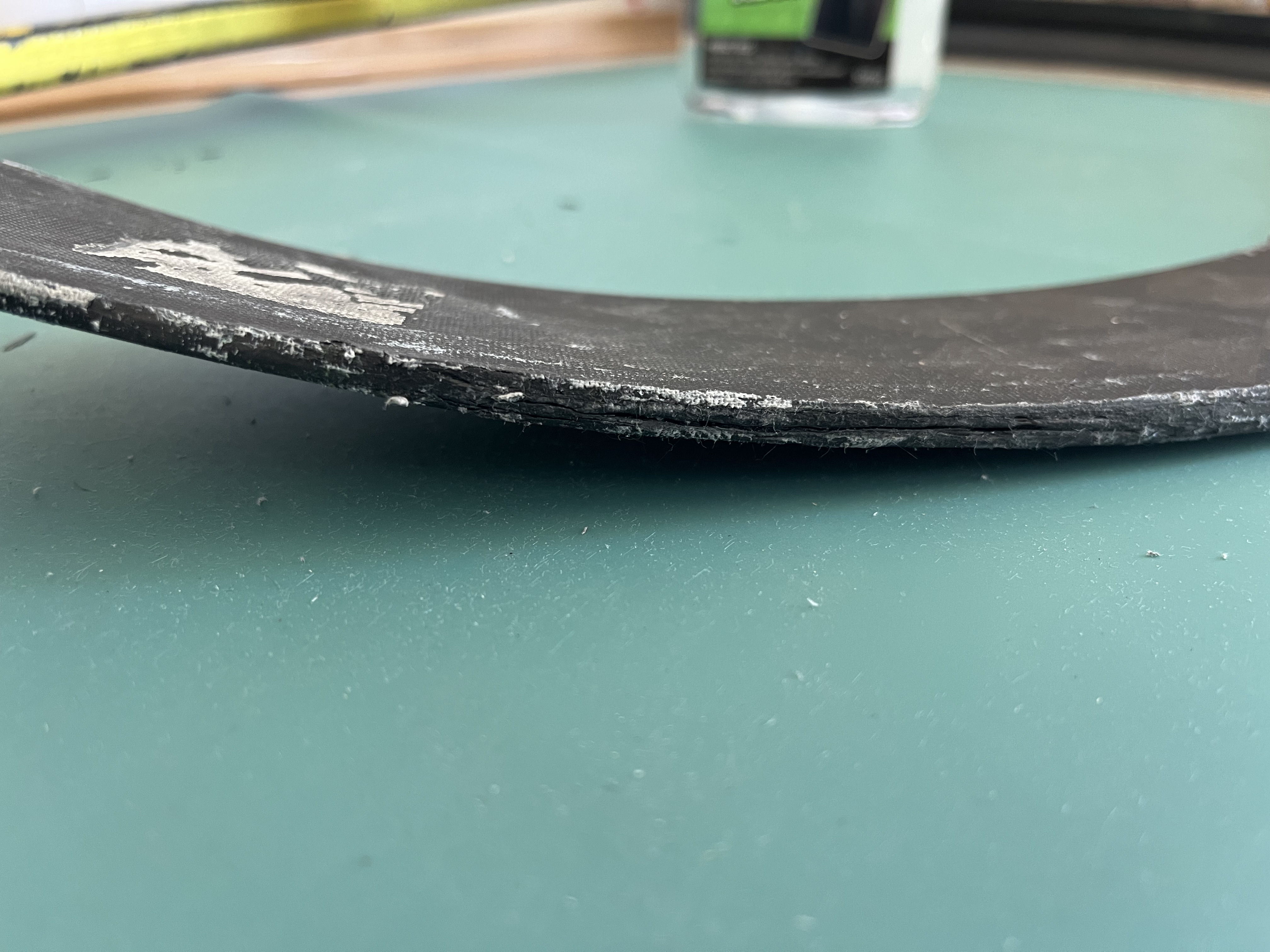 Delaminating bottom edge of a blade