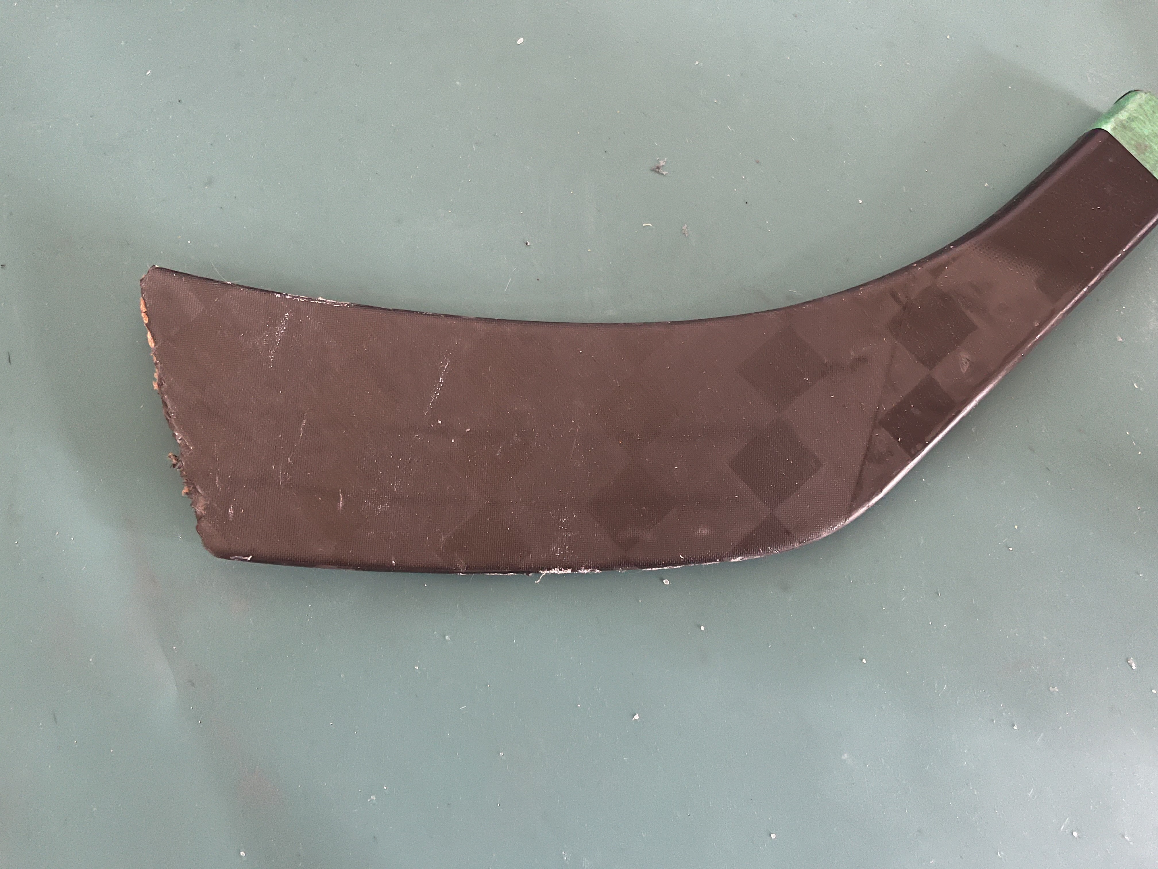 Carbon blade with the toe broken off and a piece missing