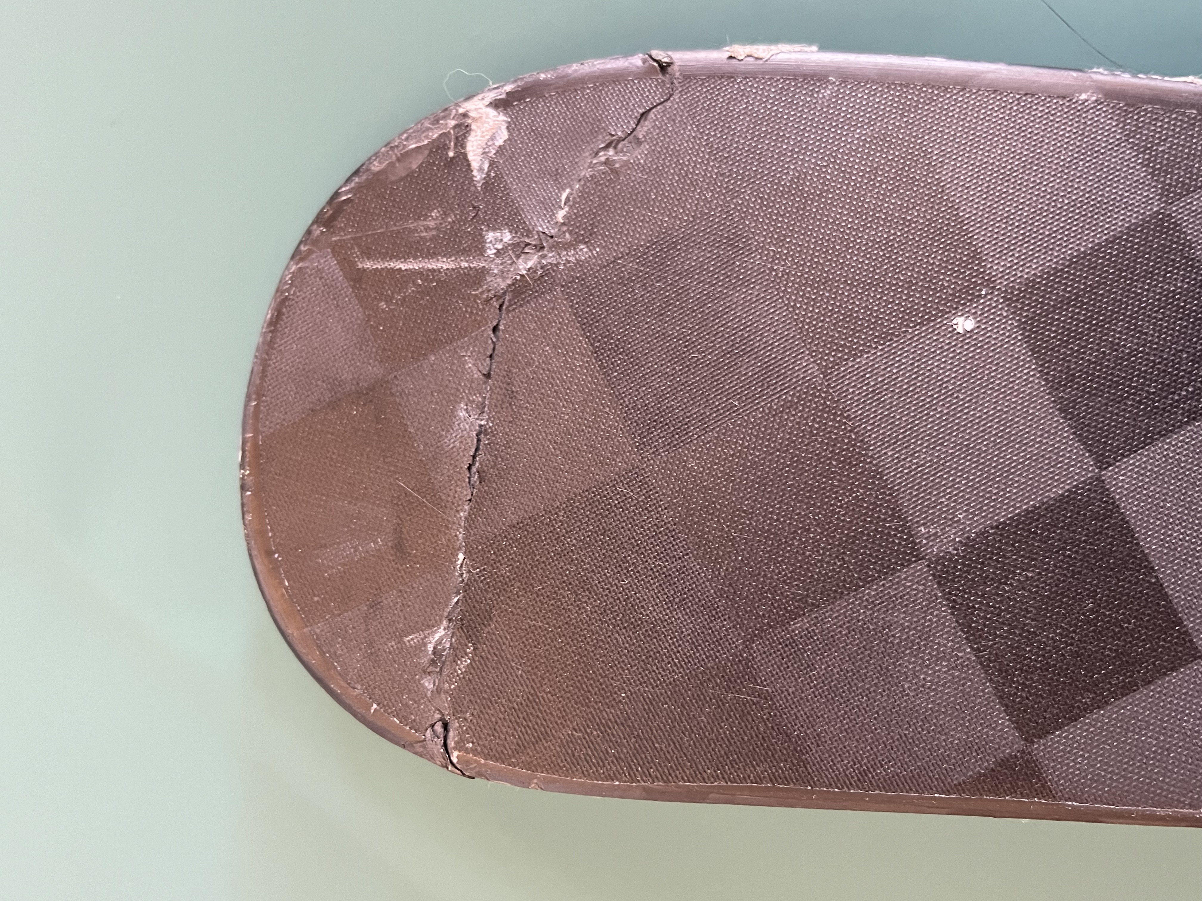 Crack running across the toe of a carbon blade